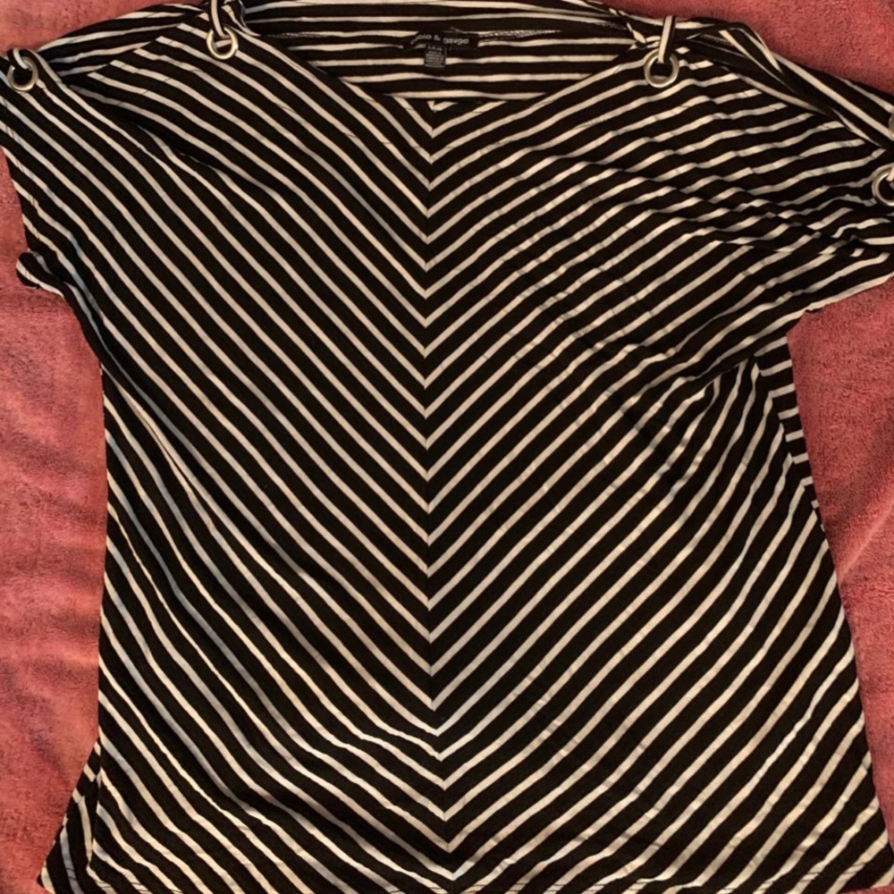 Cable&Gauge size large. Black and white striped blouse. Ring top sleeve.